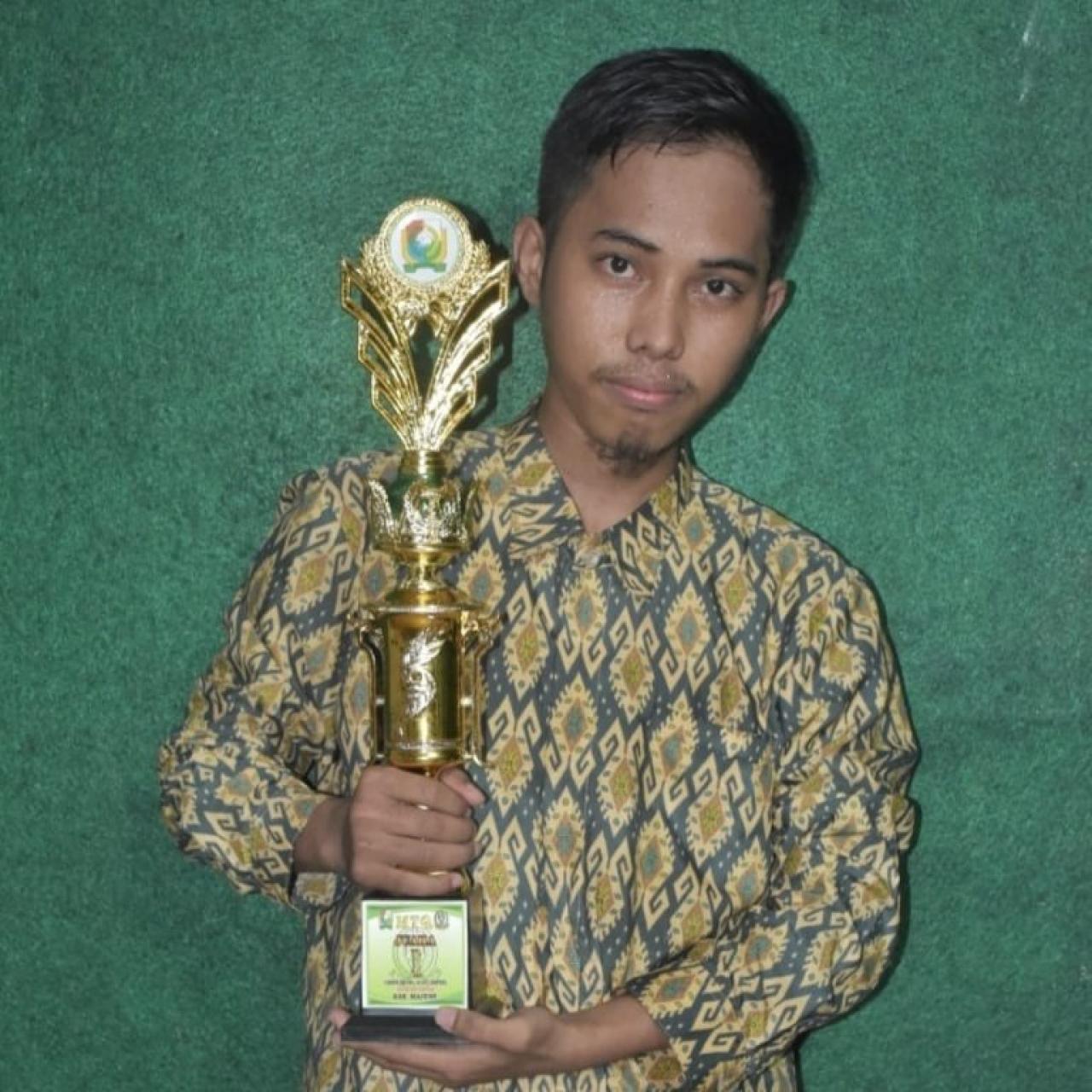 Gambar Nasrudin, Mahasiswa Jurusan IQT Raih Juara 1 Lomba MTQ Tingkat Kabupaten Majene