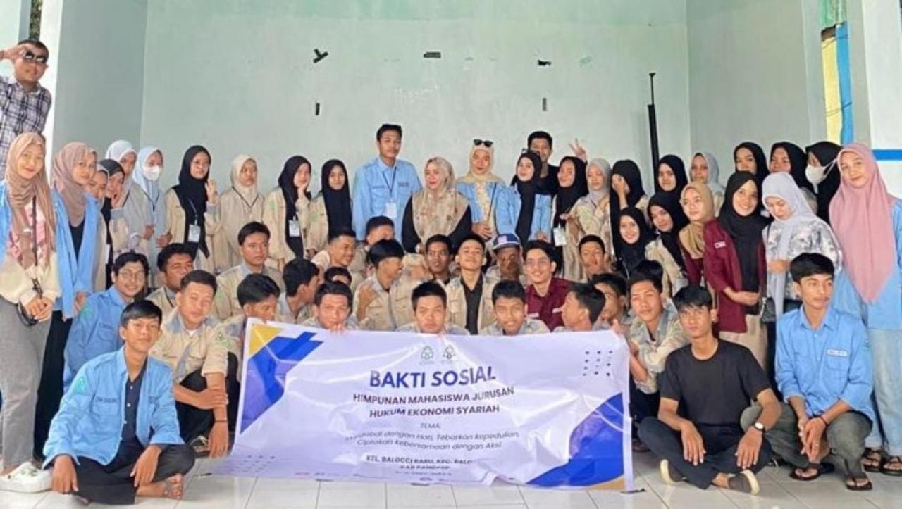 Gambar Realisasikan Tri Dharma Perguruan Tinggi HMJ HES Gelar Bakti Sosial
